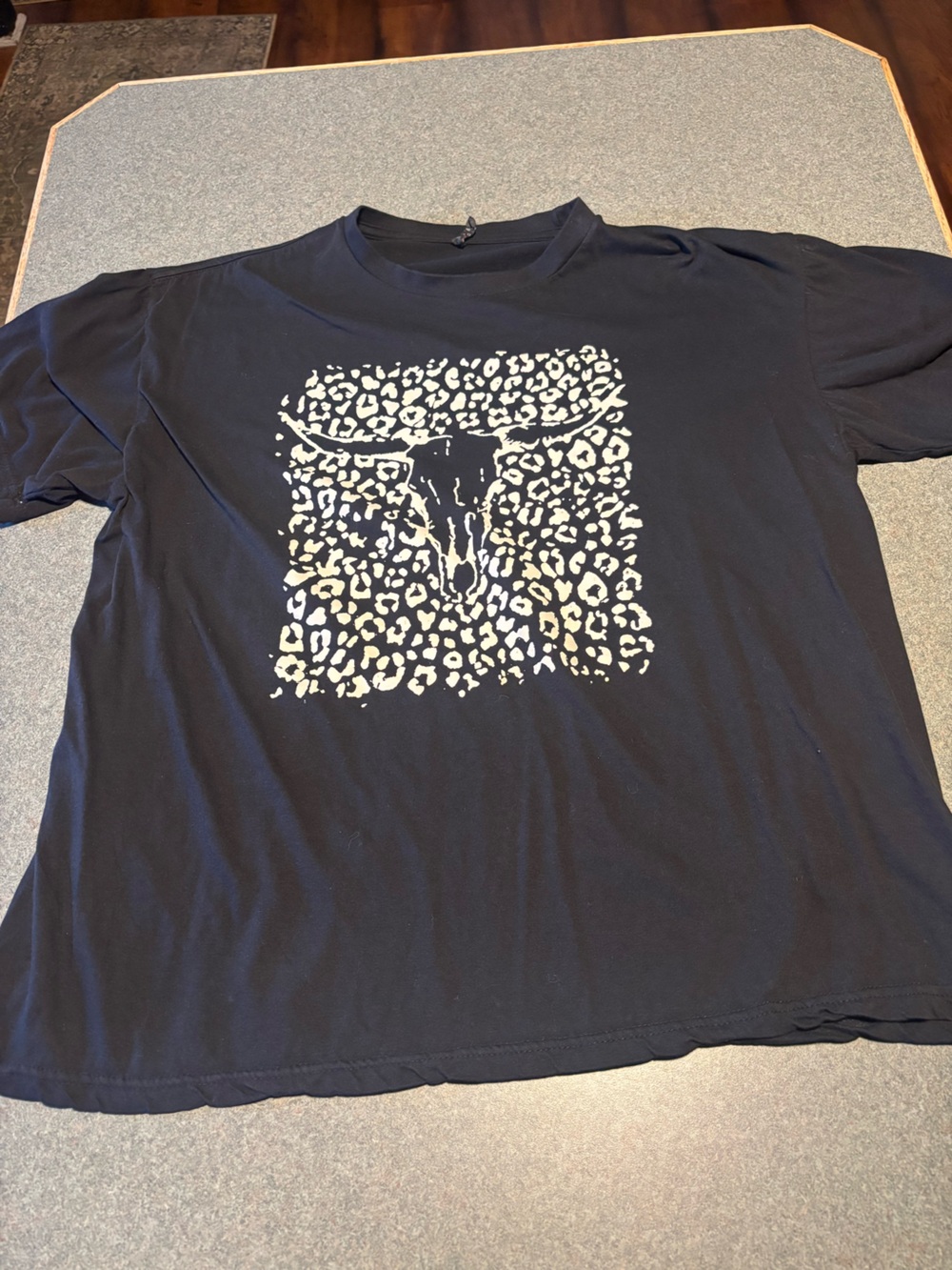 Men's Black Graphic Tee with Cream Leopard Longhorn Design
